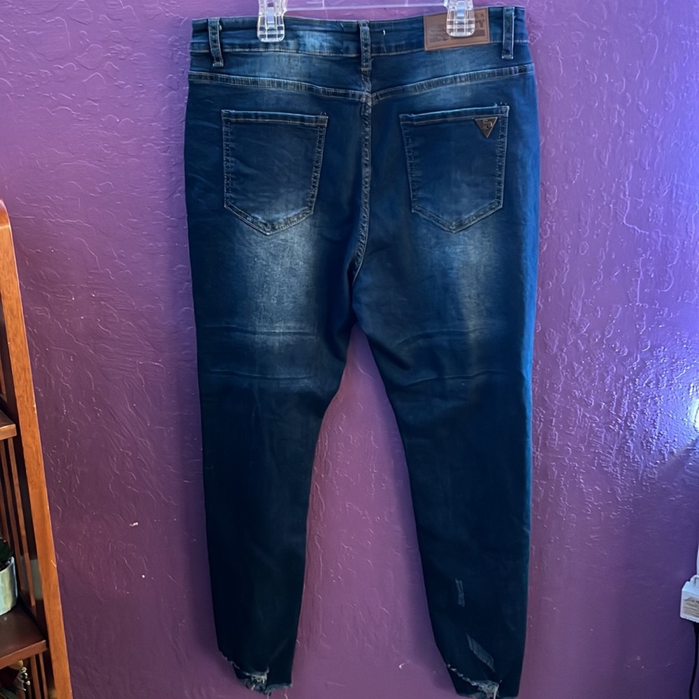 ripped blue jeans - Picture 2 of 4
